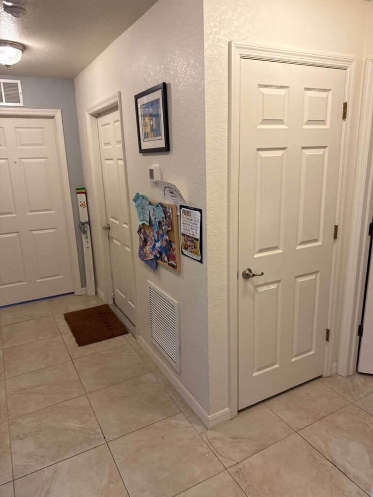 Inspection of an HVAC return air vent and surrounding drywall for dust accumulation and moisture issues.