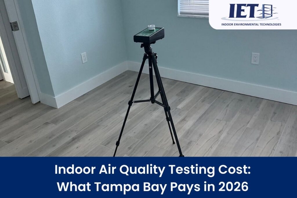 Professional indoor air quality testing equipment set up in a room.