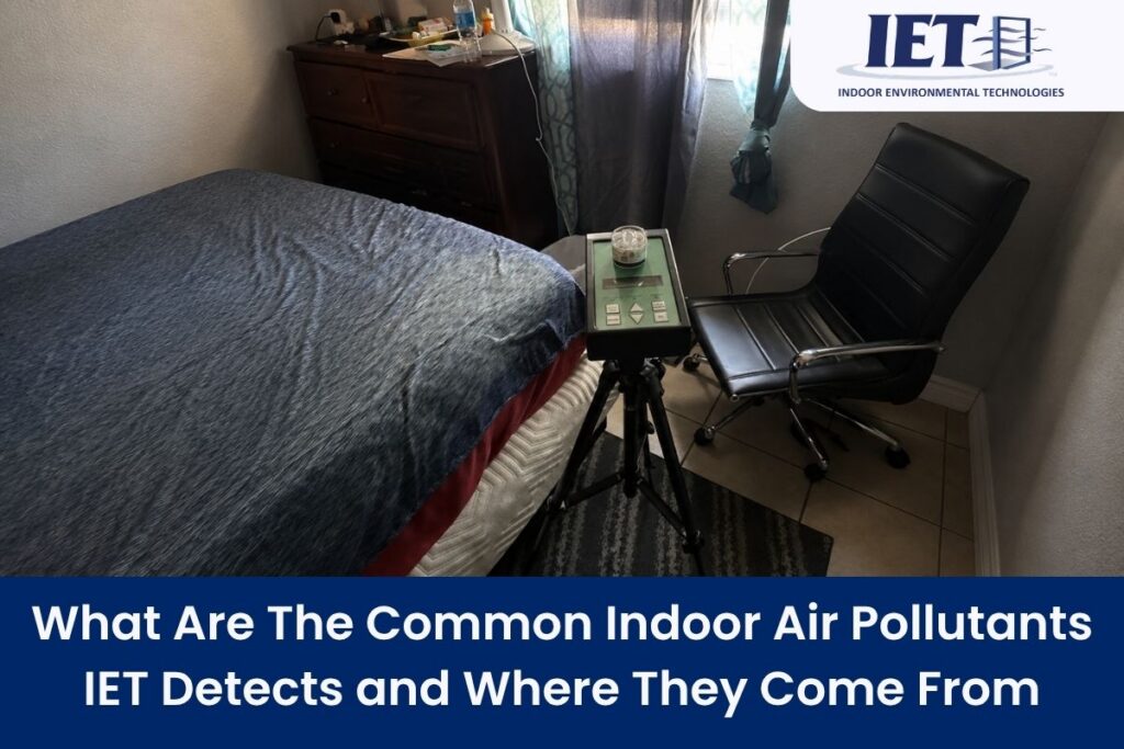Indoor air quality testing device set up next to a bed in a room.